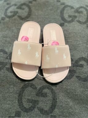 Pink Polo Slides.